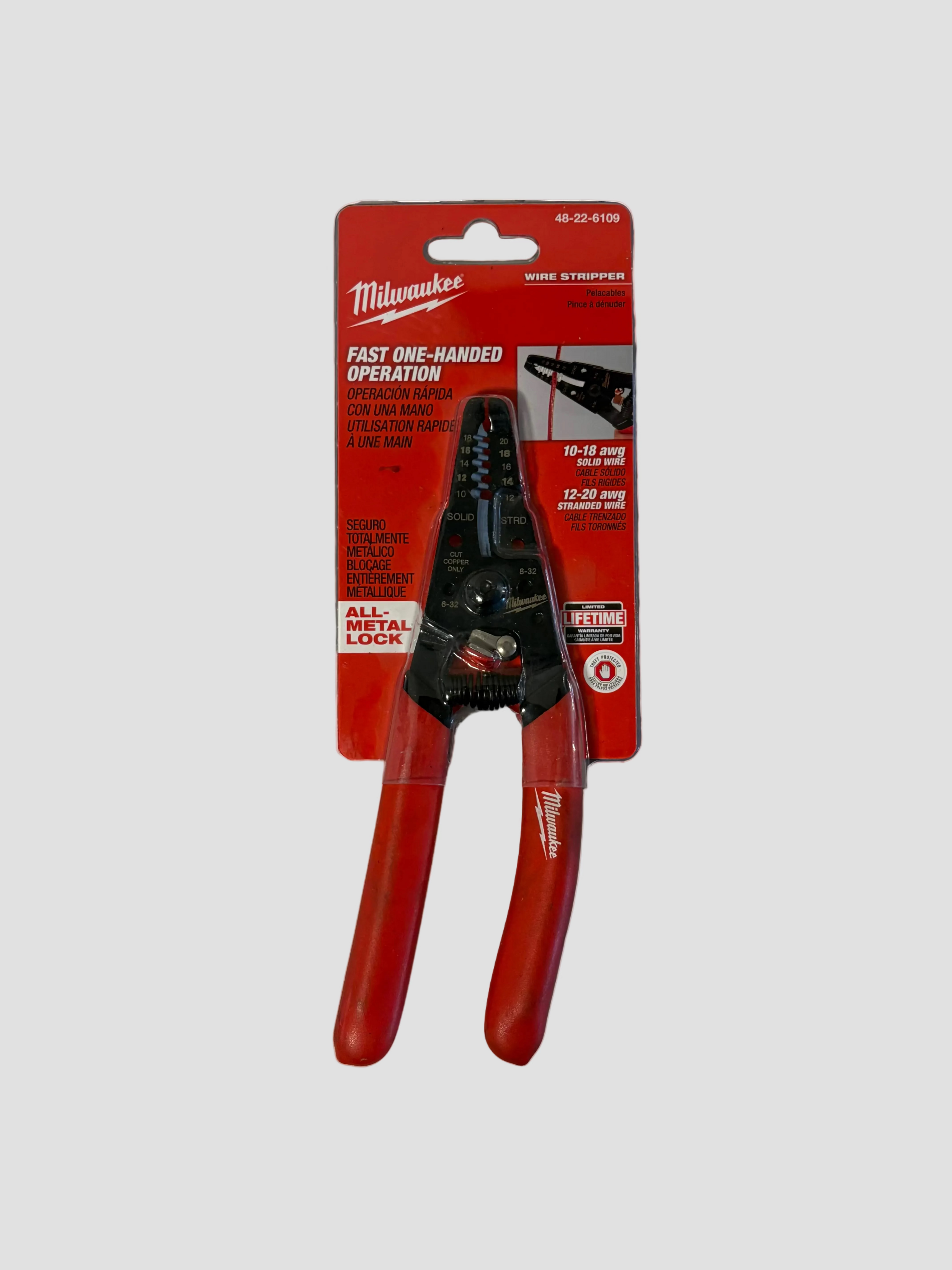 Milwaukee wire styrofoam cutters in red and black, packaged in its original red and gray retail blister card on a light gray surface.