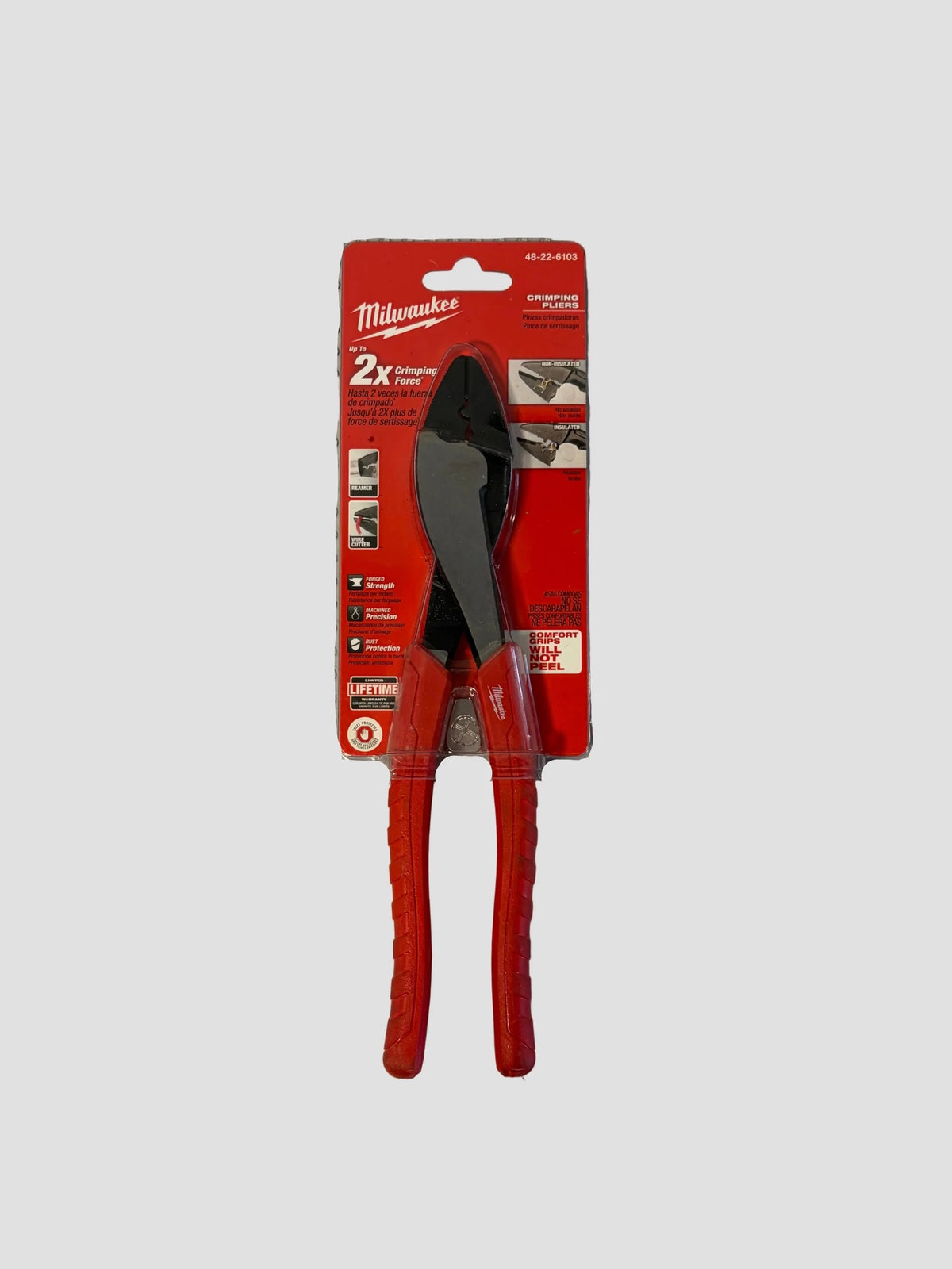 Milwaukee 2x wire cutting shears in red handle and red retail blister packaging, shown against a solid gray background.
