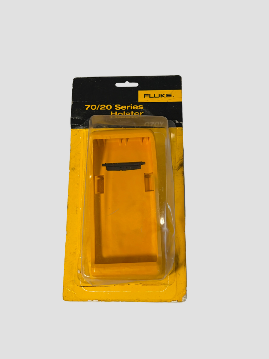 Fluke 70/20 Series Holster packaging on a gray background