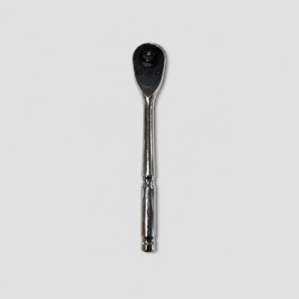 Metal wrench on a light gray background